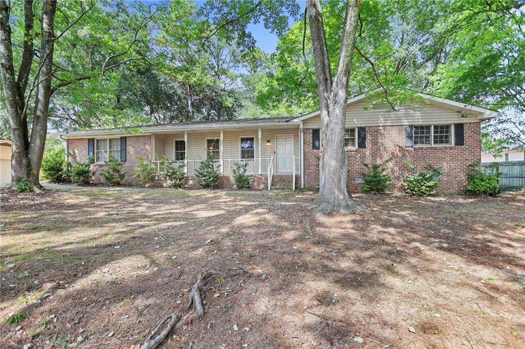 20 Carriage Trace Stockbridge, GA 30281 - Photo 4 of 35 front view of a house with a yard