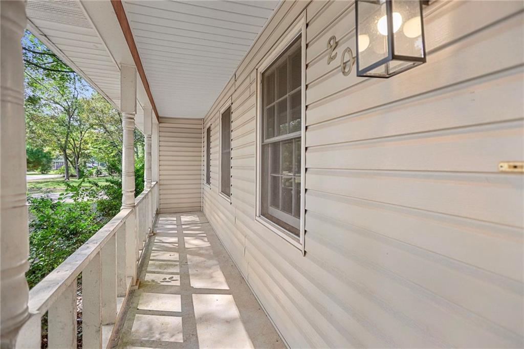 20 Carriage Trace Stockbridge, GA 30281 - Photo 7 of 35 a view of balcony with wooden floor and fence
