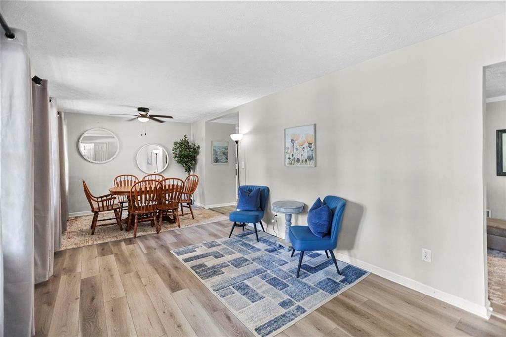 20 Carriage Trace Stockbridge, GA 30281 - Photo 9 of 35 a living room with furniture and wooden floor