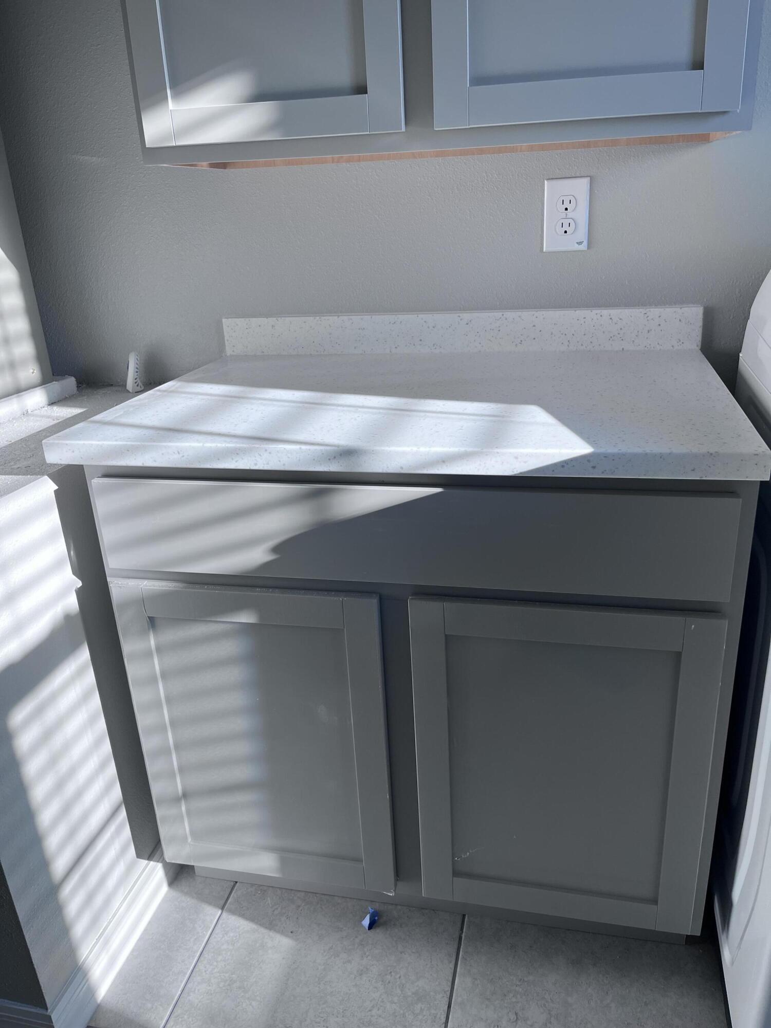 9237 Swiss Road Spring Hill, FL 34606 - Photo 12 of 15 a close view of washer and dryer