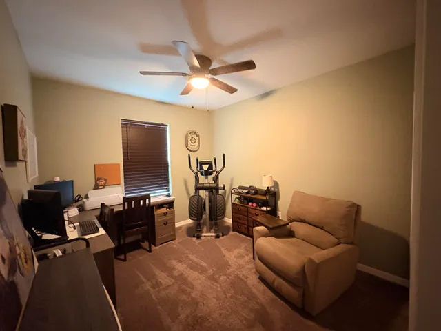 a room with furniture and a flat screen tv