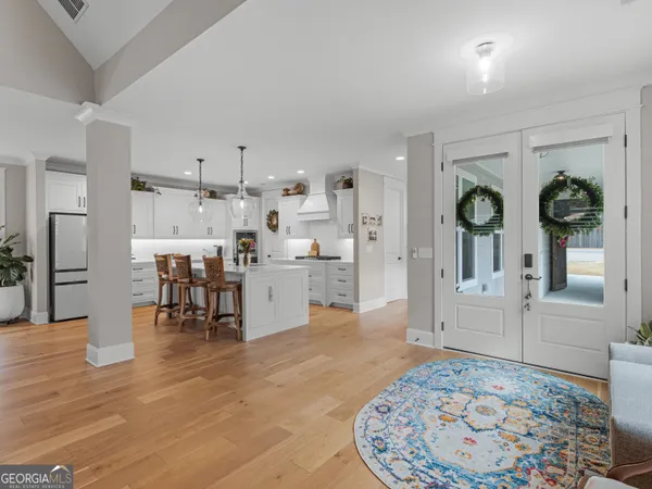 a bathroom with a sink vanity and a mirror