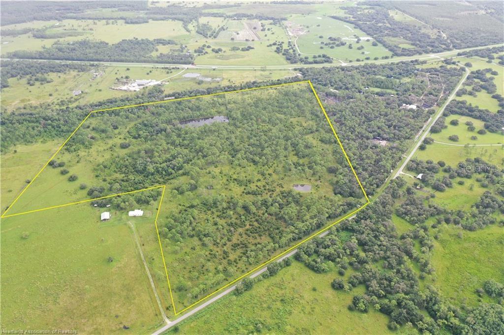Dairy Road Venus, FL 33960 - Photo 5 of 12 a view of a lake from a balcony