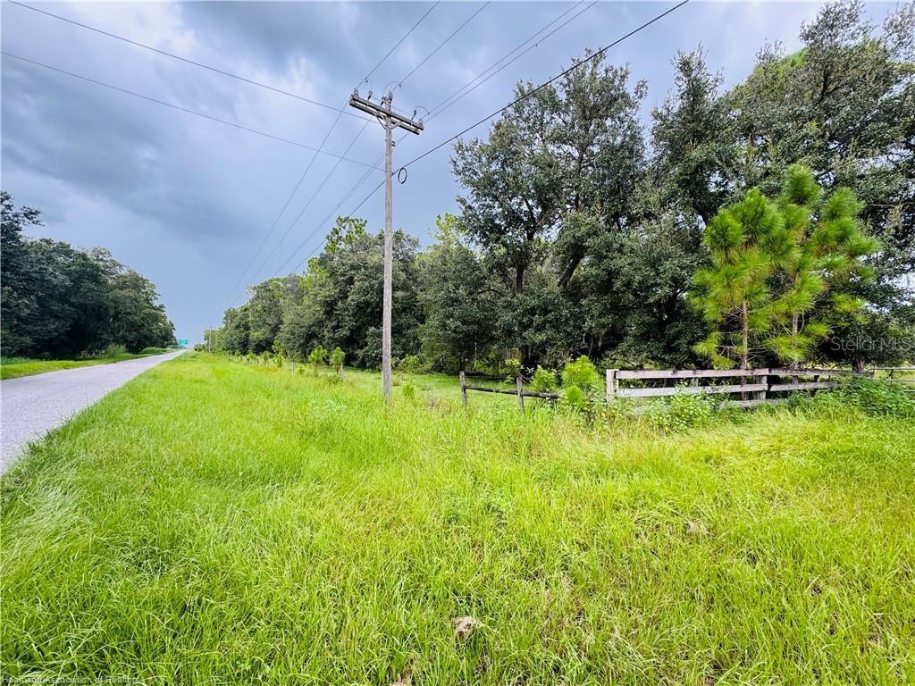 Dairy Road Venus, FL 33960 - Photo 10 of 12 a view of a swimming pool with a yard