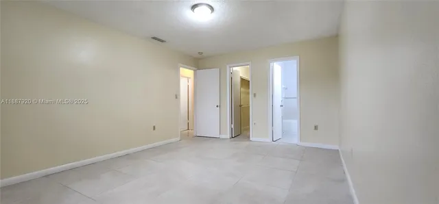 an empty room with an entryway