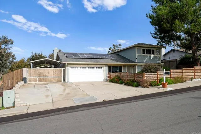 a front view of a house with a garage