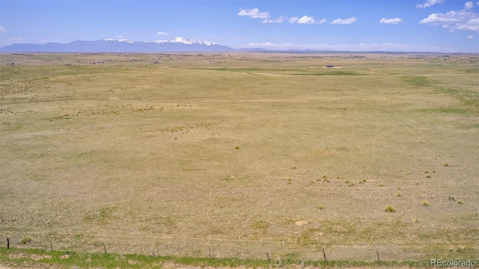 13886 Log Road Peyton, CO 80831 - Photo 3 of 14 a view of an ocean beach