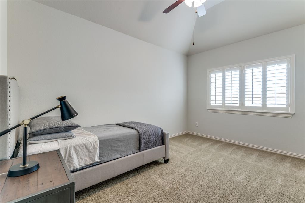 8237 Inverness The Colony, TX 75056 - Photo 16 of 22 a bedroom with a bed and window