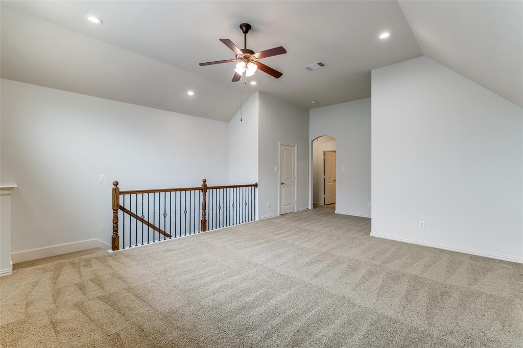 8237 Inverness The Colony, TX 75056 - Photo 20 of 22 a view of a livingroom with a ceiling fan and window