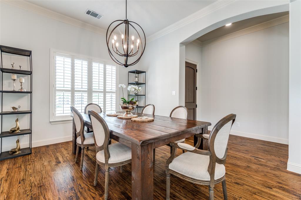 8237 Inverness The Colony, TX 75056 - Photo 5 of 22 a view of a dining room with furniture window and wooden floor