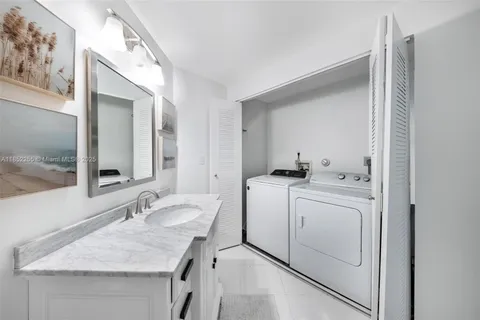 a workspace with wooden floor and a couch