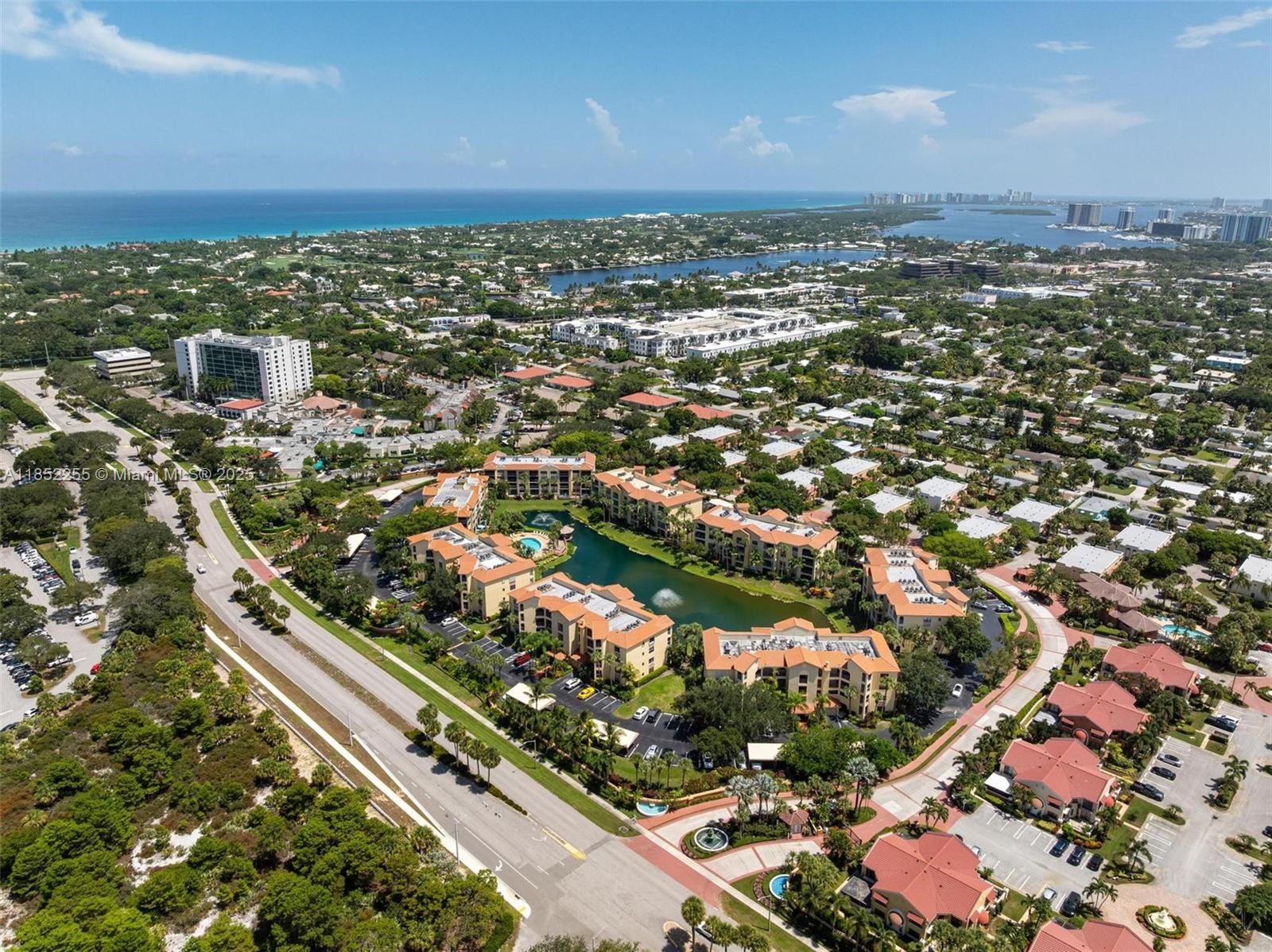 800 Uno Lago Drive, Unit 301 Juno Beach, FL 33408 - Photo 27 of 27 an aerial view of residential houses with outdoor space