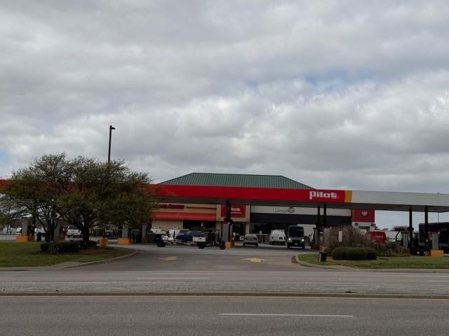 2736 Cedardale Road Lancaster, TX 75241 - Photo 8 of 9 a car parked in front of a building