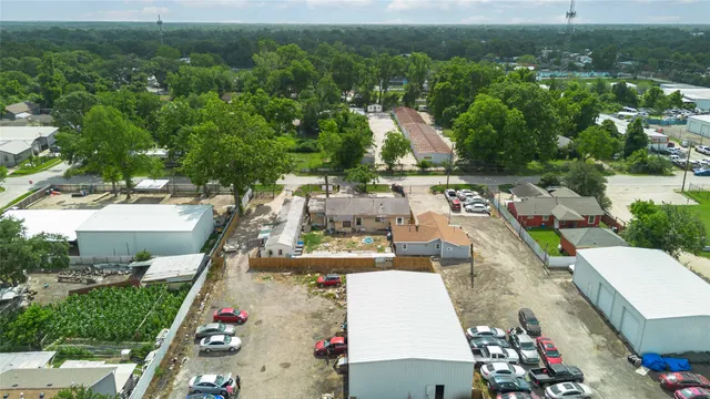 an aerial view of a house with a garden