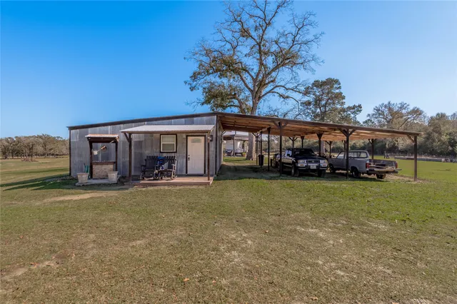 front view of a house with a big yard