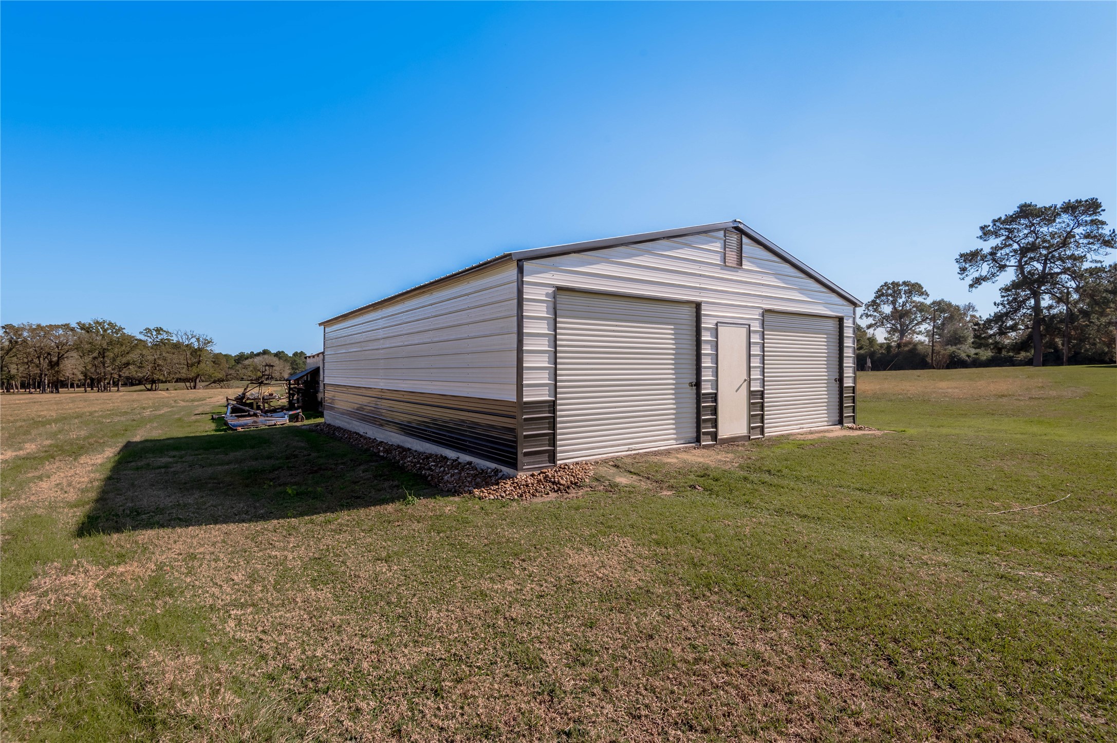 5316 Highway 19 Trinity, TX 75862 - Photo 23 of 34 a front view of a house with a yard