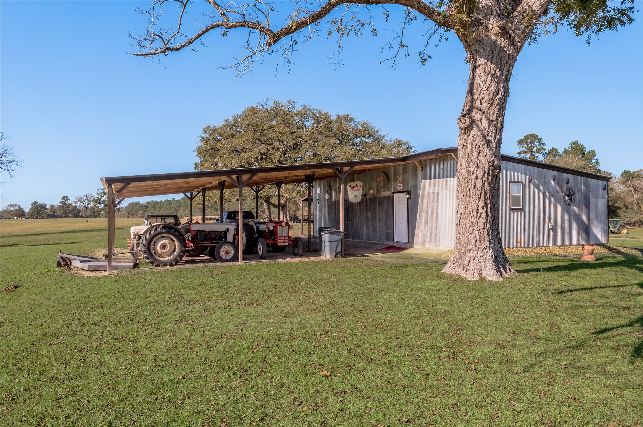 5316 Highway 19 Trinity, TX 75862 - Photo 28 of 34 a view of a house with backyard and porch