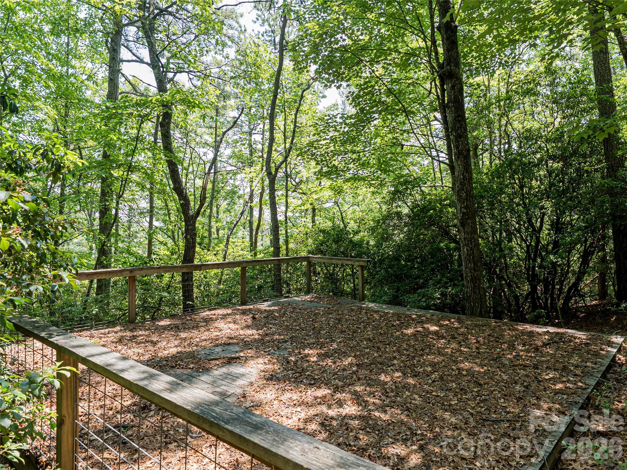 1000 Sutton Creek Road Pisgah Forest, NC 28768 - Photo 8 of 30 a view of a backyard