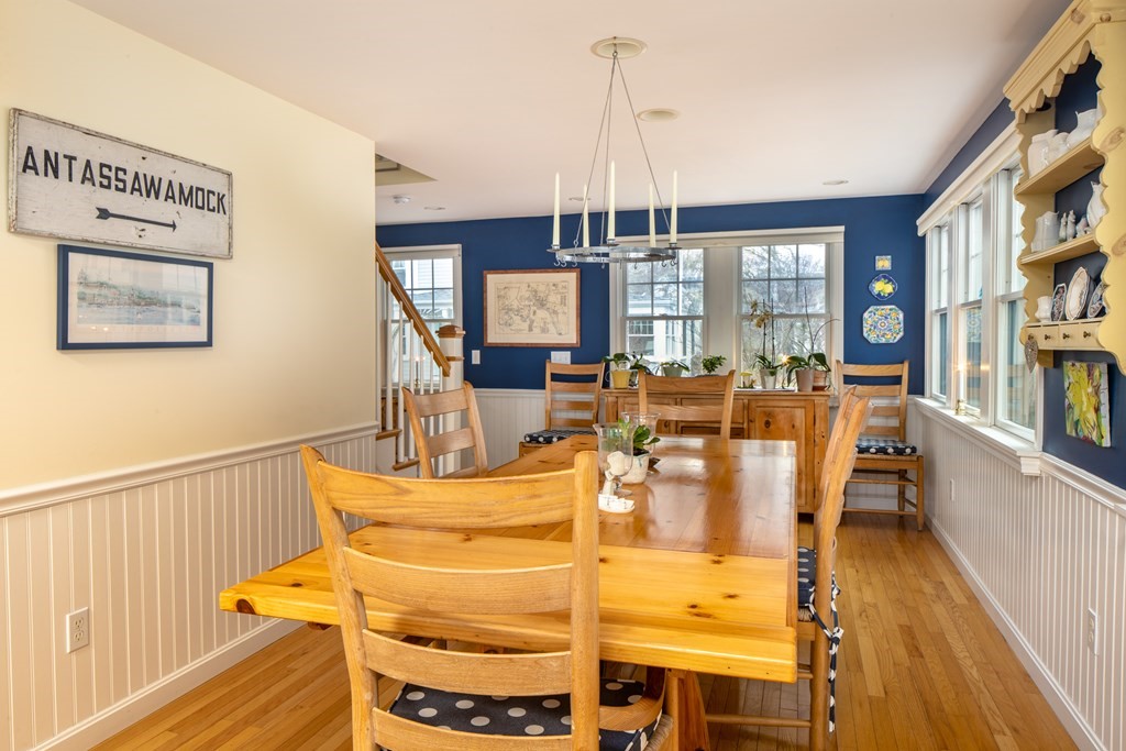 7 Mattakiset Road Mattapoisett, MA 02739 - Photo 15 of 39 a view of a dining room with furniture window and wooden floor
