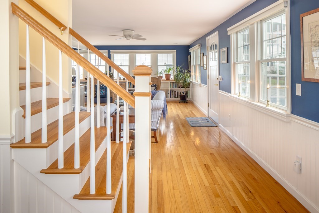 7 Mattakiset Road Mattapoisett, MA 02739 - Photo 16 of 39 a view of entryway and hall with wooden floor