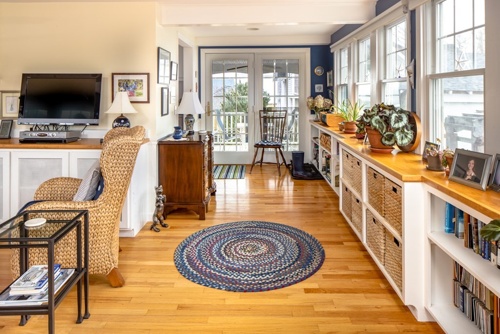 7 Mattakiset Road Mattapoisett, MA 02739 - Photo 19 of 39 a living room with furniture fireplace and a flat screen tv