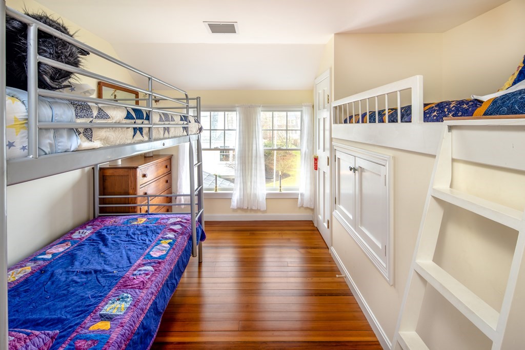 7 Mattakiset Road Mattapoisett, MA 02739 - Photo 29 of 39 a very nice looking room with wooden floor and furniture