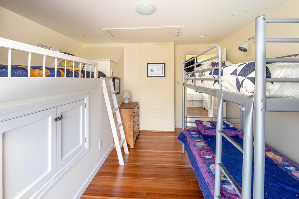 7 Mattakiset Road Mattapoisett, MA 02739 - Photo 30 of 39 a view of a hallway with wooden floor and entryway