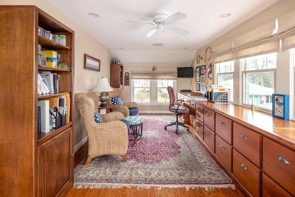 7 Mattakiset Road Mattapoisett, MA 02739 - Photo 33 of 39 a living room with furniture large window and a book shelf