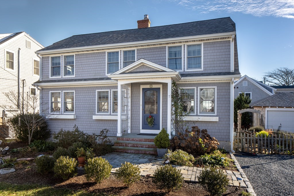 7 Mattakiset Road Mattapoisett, MA 02739 - Photo 6 of 39 a front view of a house with a yard