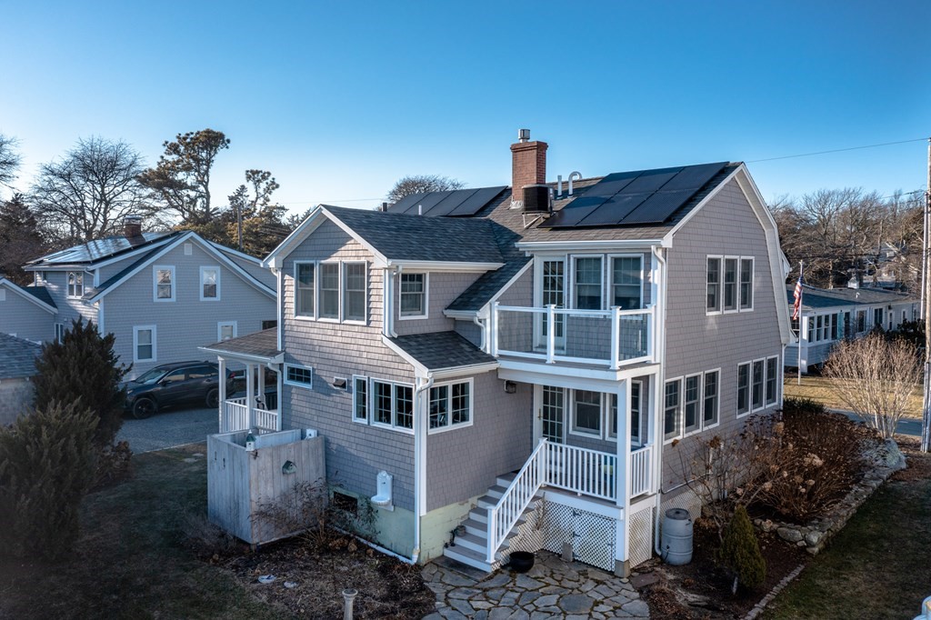 7 Mattakiset Road Mattapoisett, MA 02739 - Photo 9 of 39 a front view of a house with a yard