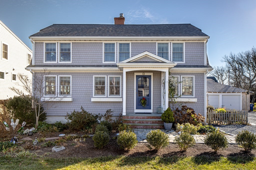 7 Mattakiset Road Mattapoisett, MA 02739 - Photo 10 of 39 a front view of a house with a yard
