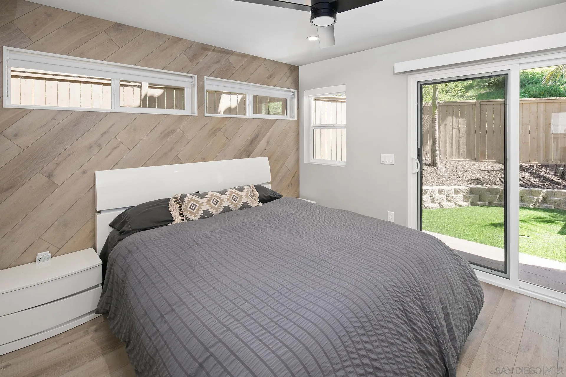 1103 Paradise Trail Road Chula Vista, CA 91915 - Photo 7 of 20 a bed sitting in a bedroom next to a window