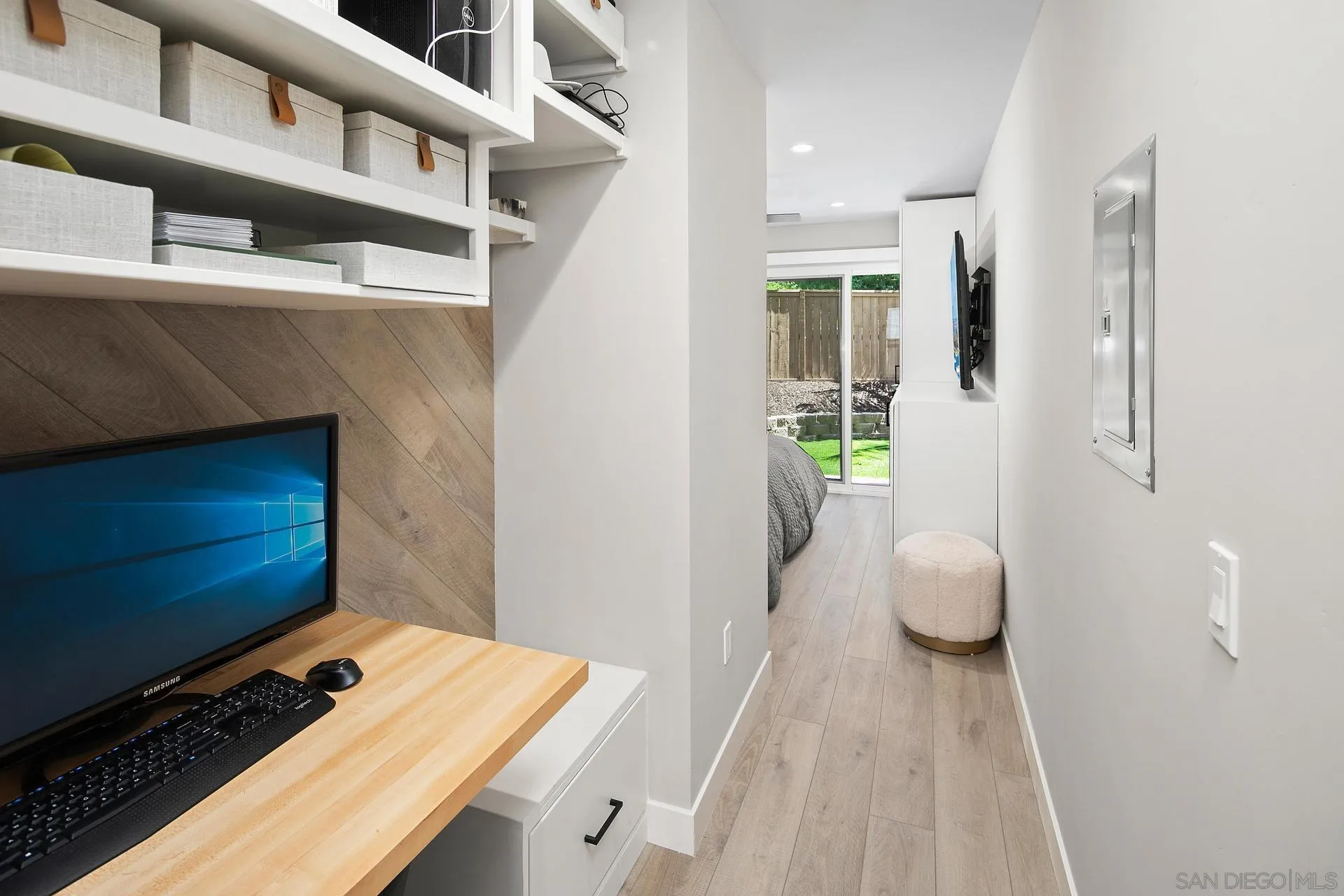 1103 Paradise Trail Road Chula Vista, CA 91915 - Photo 8 of 20 a view of workspace with wooden floor and chair