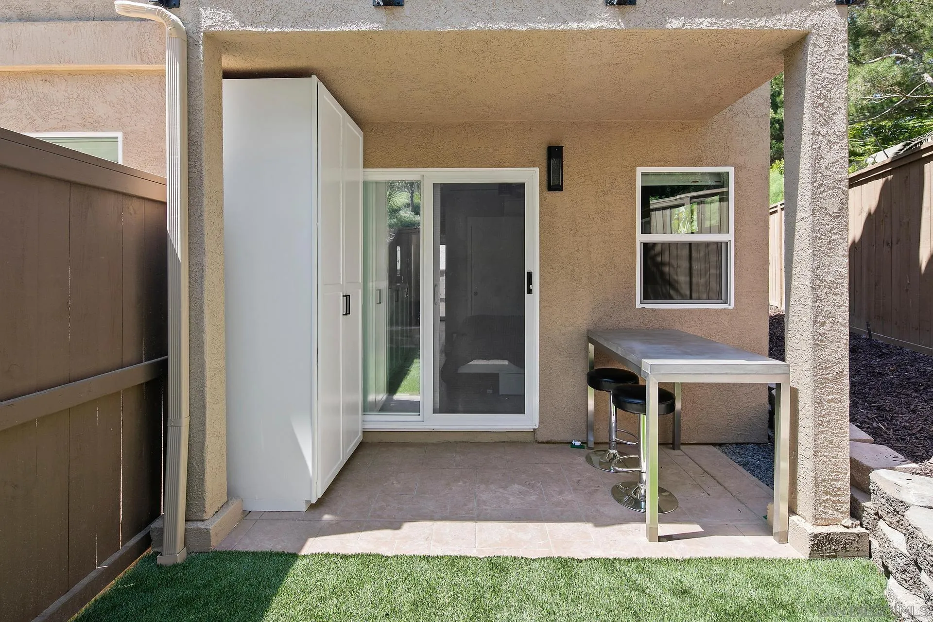 1103 Paradise Trail Road Chula Vista, CA 91915 - Photo 10 of 20 a view of house with backyard porch and furniture