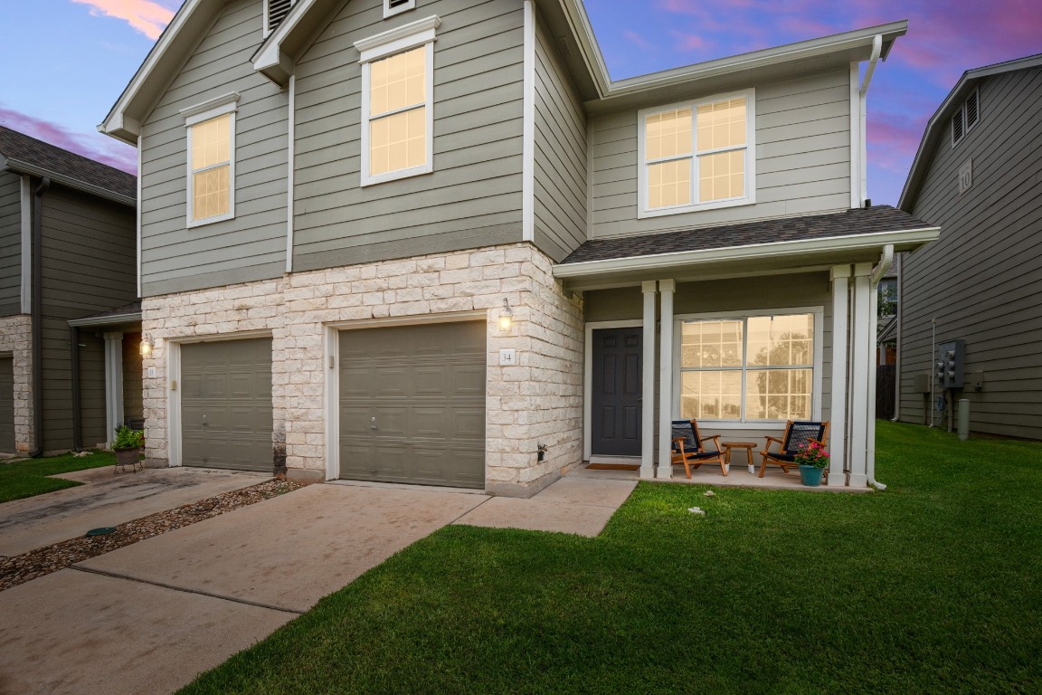 2632 Century Park Boulevard, Unit 34 Austin, TX 78727 - Photo 15 of 16 a view of a house with a yard and sitting area