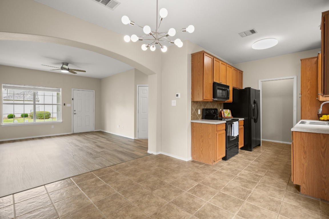 2632 Century Park Boulevard, Unit 34 Austin, TX 78727 - Photo 6 of 16 a view of a kitchen with a sink and cabinets