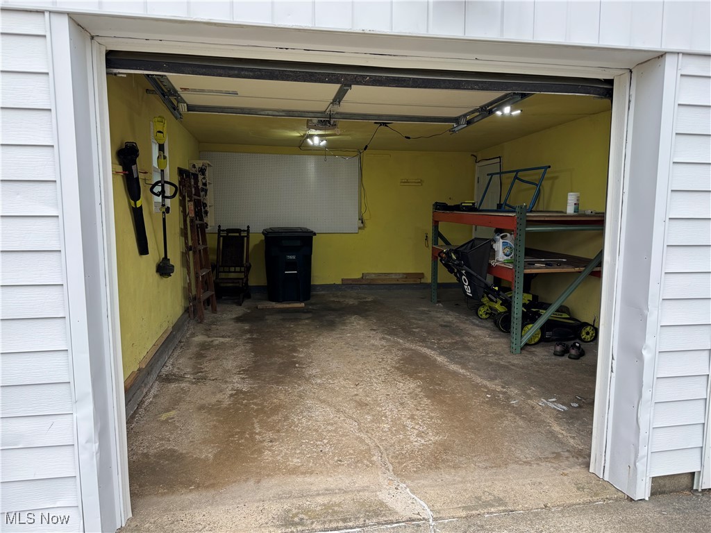 1139 Kessel Avenue Akron, OH 44310 - Photo 8 of 36 Garage featuring a garage door opener