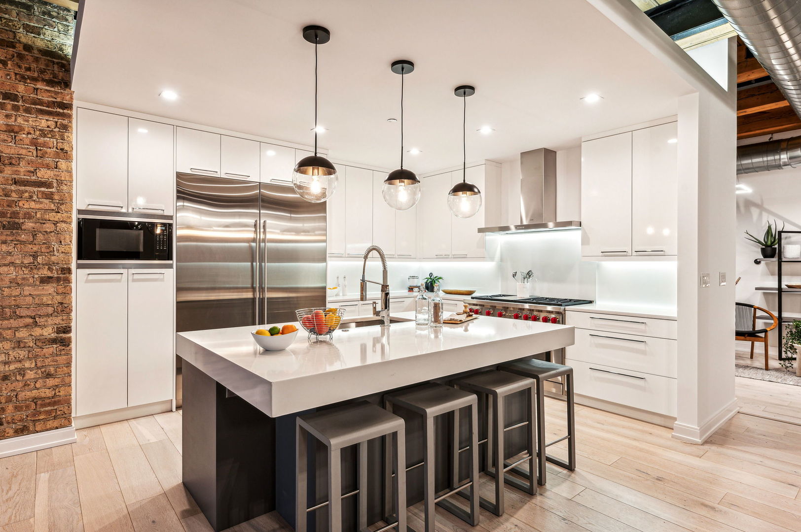 223 West Lake Street, Unit PH5S Chicago, IL 60606 - Photo 12 of 32 a kitchen with a sink refrigerator and cabinets