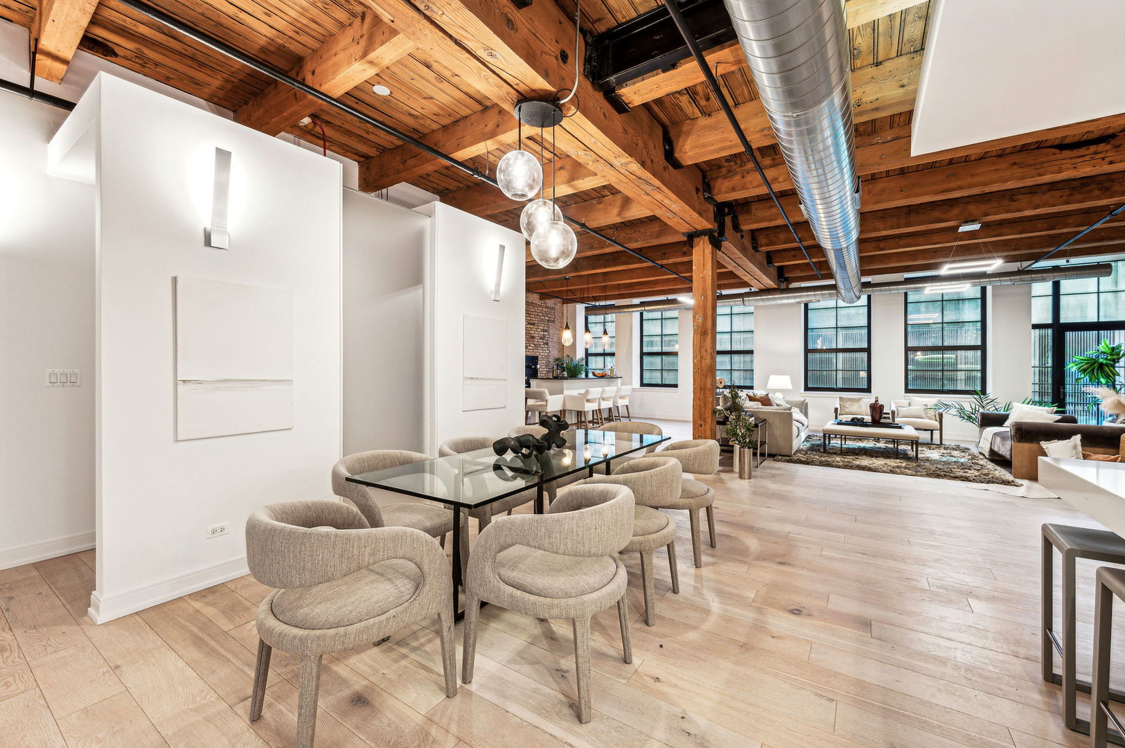 223 West Lake Street, Unit PH5S Chicago, IL 60606 - Photo 15 of 32 a room with lots of furniture and a chandelier