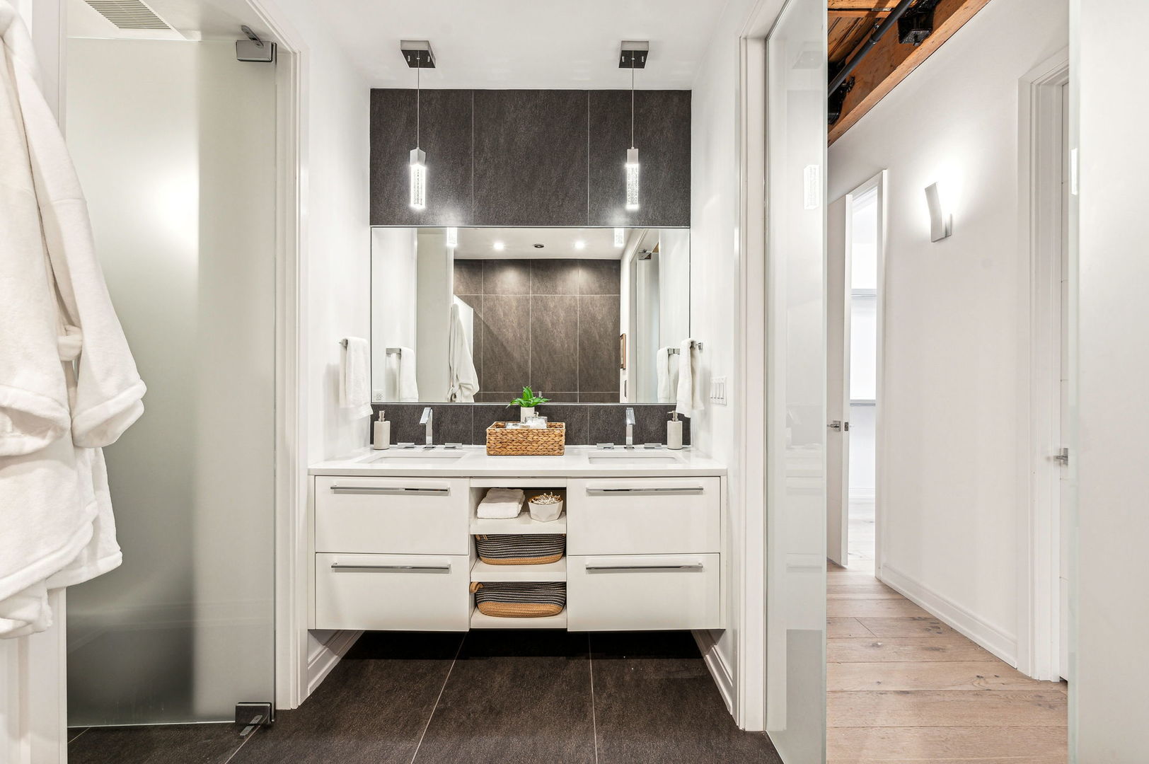 223 West Lake Street, Unit PH5S Chicago, IL 60606 - Photo 21 of 32 a bathroom with a sink and a mirror