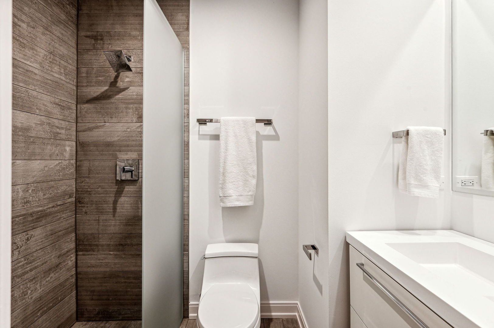 223 West Lake Street, Unit PH5S Chicago, IL 60606 - Photo 24 of 32 a bathroom with a sink a toilet and shower