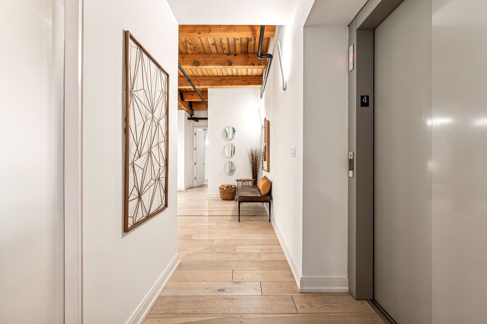 223 West Lake Street, Unit PH5S Chicago, IL 60606 - Photo 29 of 32 a view of a hallway with wooden floor and a living room