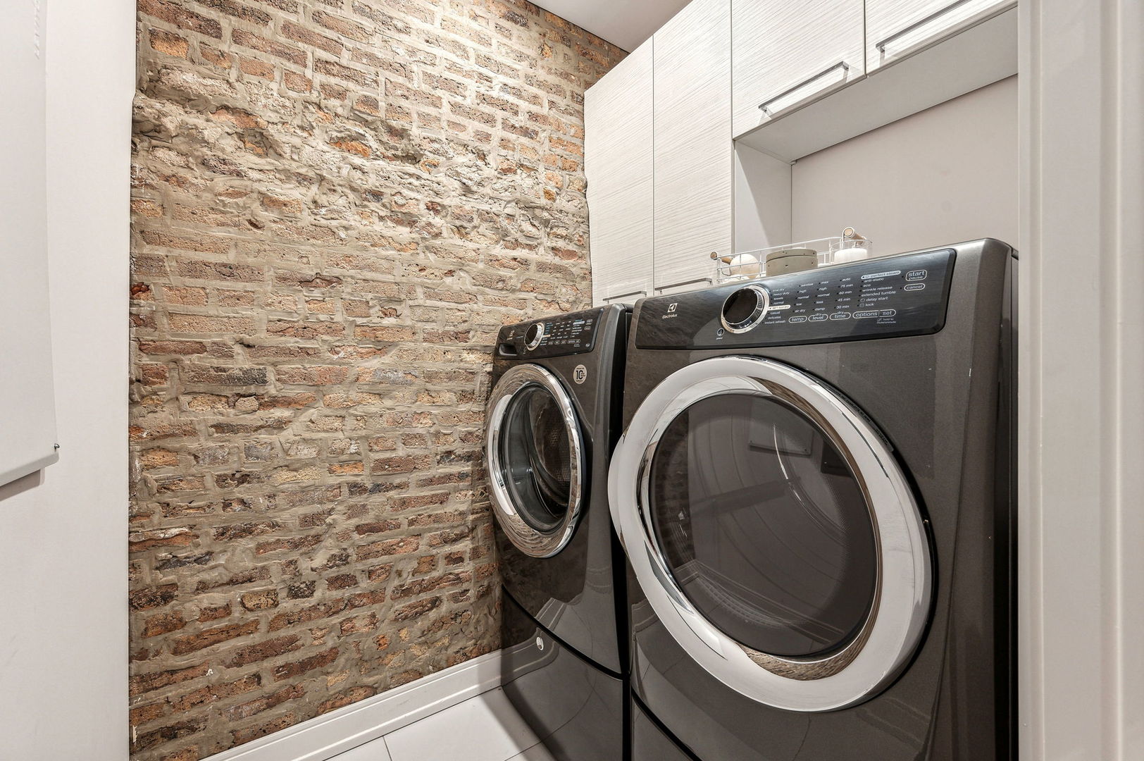 223 West Lake Street, Unit PH5S Chicago, IL 60606 - Photo 30 of 32 a close up view of a washer and dryer