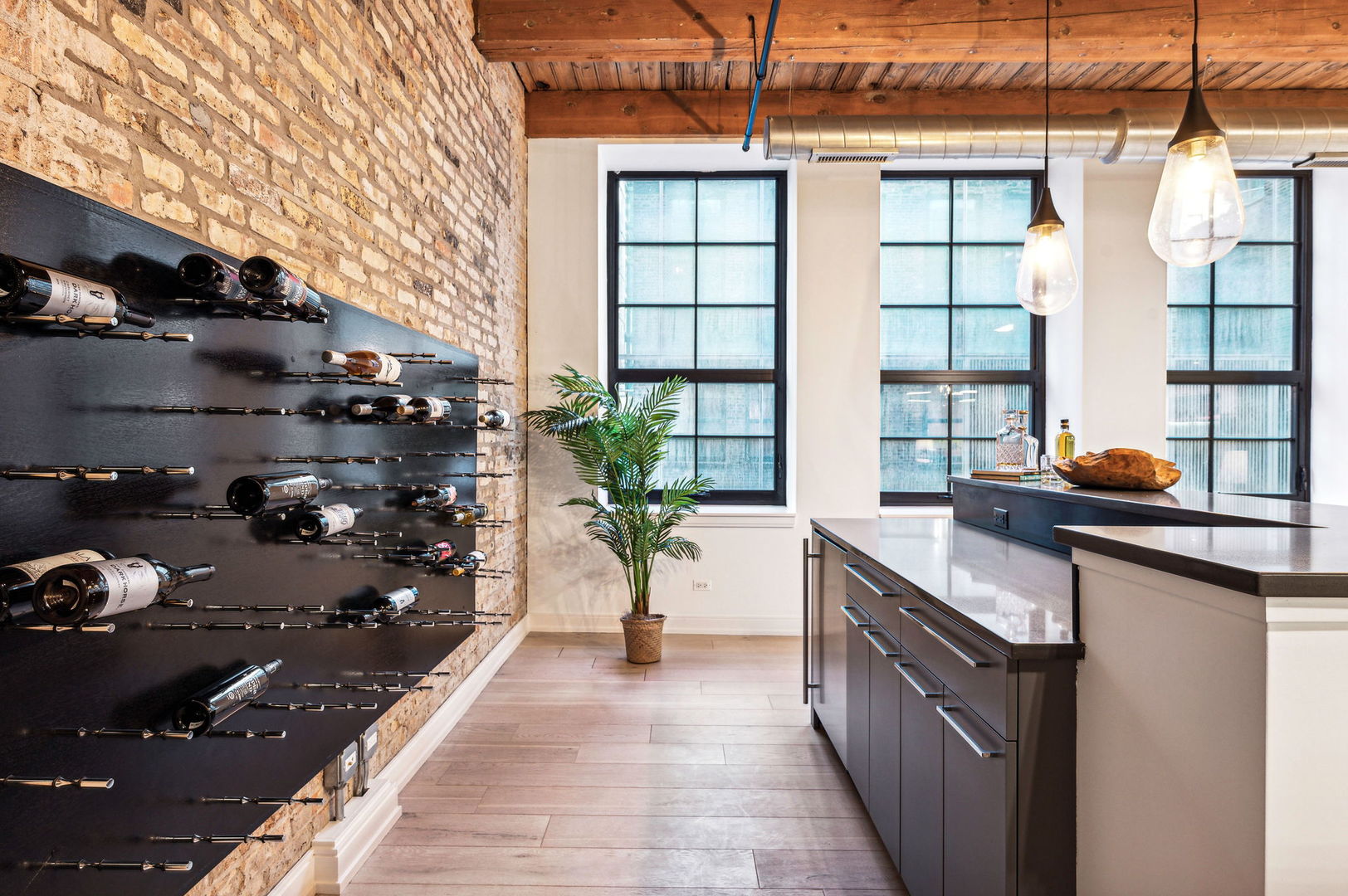 223 West Lake Street, Unit PH5S Chicago, IL 60606 - Photo 9 of 32 a kitchen with a sink and a stove top oven