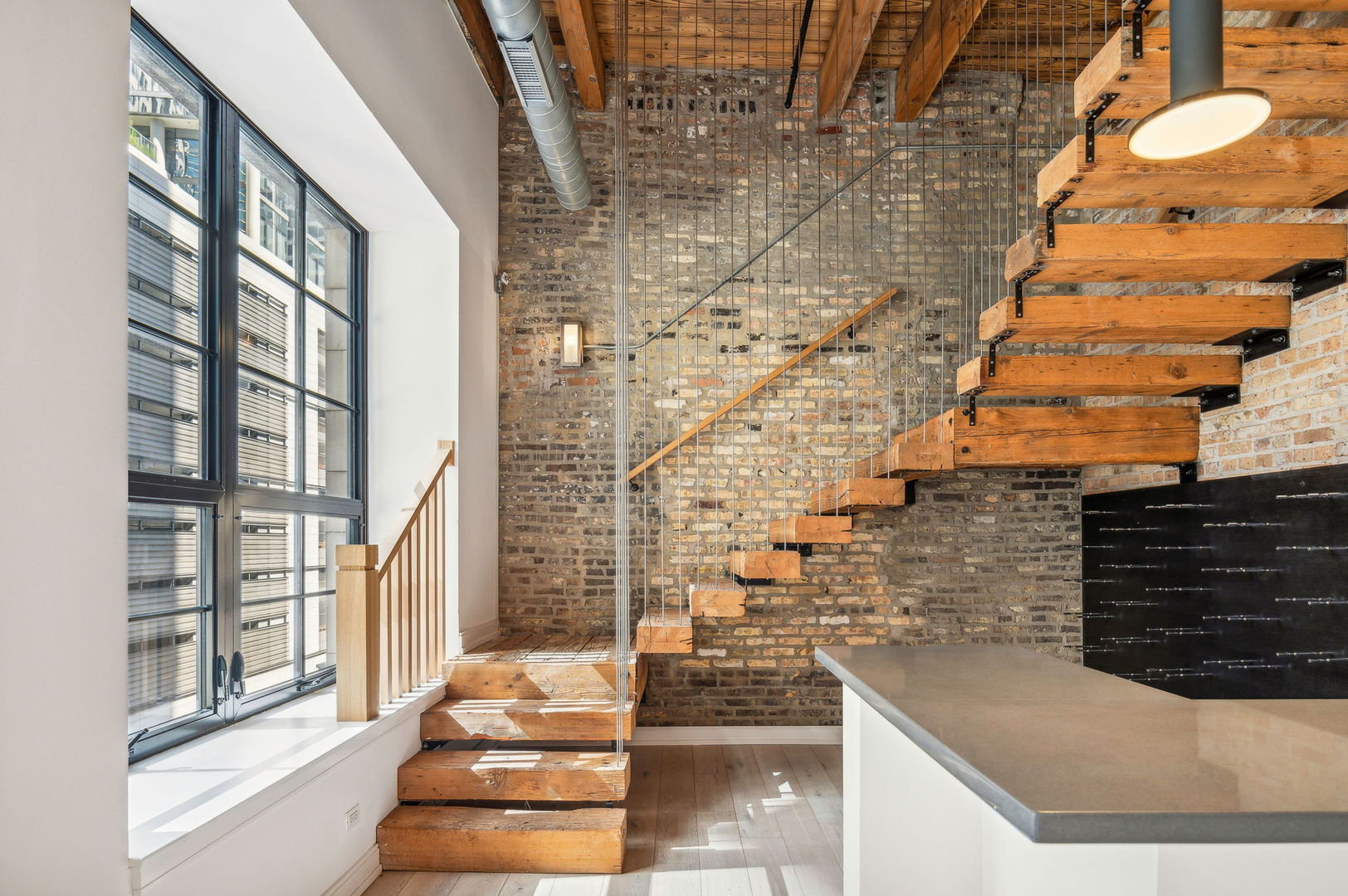 223 West Lake Street, Unit PH5S Chicago, IL 60606 - Photo 10 of 32 a view of an entryway with brick walls