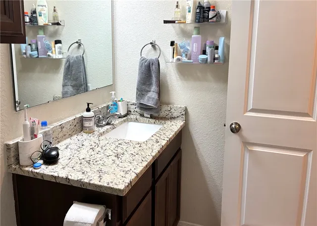 a view of a bathroom with a glass door
