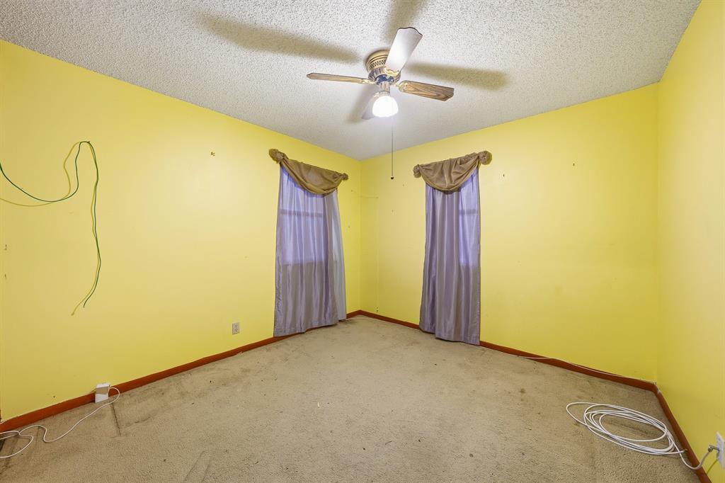 3091 Venice Way Miramar, FL 33025 - Photo 17 of 27 a view of a room with a window and ceiling fan