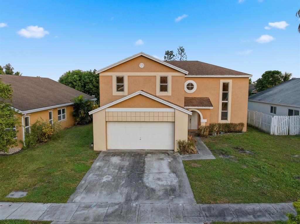 3091 Venice Way Miramar, FL 33025 - Photo 23 of 27 a front view of a house with a yard