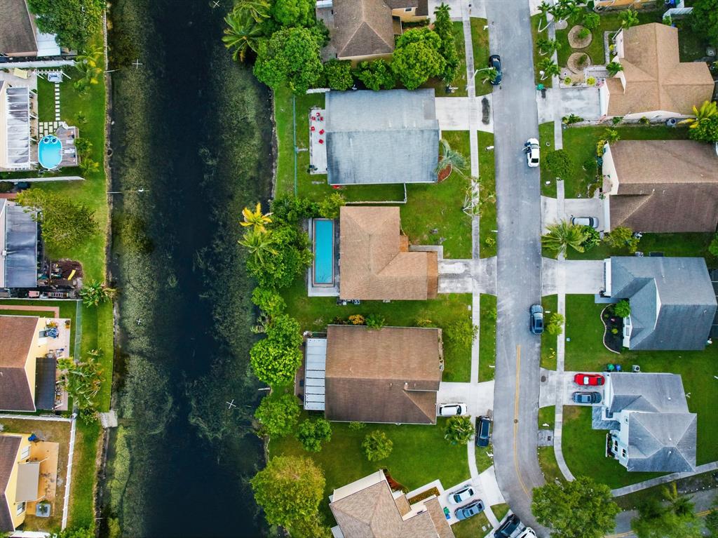 3091 Venice Way Miramar, FL 33025 - Photo 26 of 27 an aerial view of a house with a garden and swimming pool