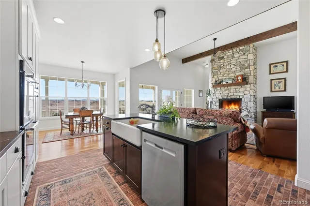a kitchen with stove and cabinets